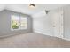 Upstairs bedroom with neutral walls and carpet flooring at 1400 Village Creek Se Cir # 12A, Atlanta, GA 30316