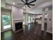 Living room with hardwood floors, fireplace, and ceiling fan at 1400 Village Creek Se Cir # 12A, Atlanta, GA 30316