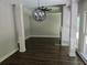 Formal dining room with dark hardwood floors and chandelier at 1400 Village Creek Se Cir # 12A, Atlanta, GA 30316