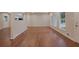 Hardwood floor living room with a view into the kitchen and backyard at 1531 Piedmont Ne Rd, Marietta, GA 30066