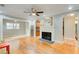 Hardwood floors, fireplace, and open concept to kitchen and dining area at 1902 Canterbury St, Decatur, GA 30032