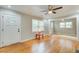 Hardwood floors, white door, and open concept to dining area at 1902 Canterbury St, Decatur, GA 30032