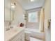 Clean bathroom with a bathtub, sink, and shower at 1902 Canterbury St, Decatur, GA 30032