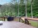 Spacious deck overlooking wooded backyard with grill at 76 Misty View Ln, Acworth, GA 30101