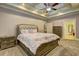 Spacious main bedroom, offering carpet and ceiling fan at 252 Madison Park Dr, Grayson, GA 30017
