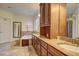 Bathroom boasts a large soaking tub and double vanity at 252 Madison Park Dr, Grayson, GA 30017
