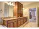 Double vanity bathroom with granite countertops and cabinets at 252 Madison Park Dr, Grayson, GA 30017