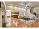 Open living room with hardwood floors, fireplace and staircase at 252 Madison Park Dr, Grayson, GA 30017