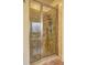 Modern bathroom with glass shower and neutral tile at 252 Madison Park Dr, Grayson, GA 30017