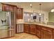 Kitchen with stainless steel appliances and wood cabinets at 252 Madison Park Dr, Grayson, GA 30017