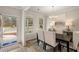 Dining room with chandelier and view into the living room at 558 Abbott Se Ct, Atlanta, GA 30354