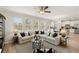 Spacious living room with sectional sofa and large windows at 558 Abbott Se Ct, Atlanta, GA 30354