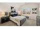 Bright bedroom featuring a comfy bed and large window at 558 Abbott Se Ct, Atlanta, GA 30354