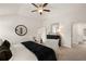 Primary bedroom with sitting area and ceiling fan at 558 Abbott Se Ct, Atlanta, GA 30354