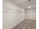 Large walk-in closet with wire shelving at 558 Abbott Se Ct, Atlanta, GA 30354