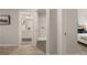 Home hallway with access to bathroom, laundry, and bedroom at 558 Abbott Se Ct, Atlanta, GA 30354