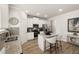 Modern kitchen with island, stainless steel appliances, and granite countertops at 558 Abbott Se Ct, Atlanta, GA 30354