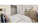 Bedroom with a queen bed and decorative cabinet at 558 Abbott Se Ct, Atlanta, GA 30354