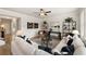 Open living room with sectional sofa and built-in shelving at 558 Abbott Se Ct, Atlanta, GA 30354