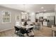 Kitchen and dining area with marble table and modern pendant lights at 558 Abbott Se Ct, Atlanta, GA 30354
