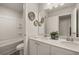 Double vanity bathroom with tub and shower at 558 Abbott Se Ct, Atlanta, GA 30354
