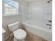 Bathroom with tub and shower combination at 2286 Foley Park St, Snellville, GA 30078