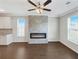 Living room with fireplace and hardwood floors at 2286 Foley Park St, Snellville, GA 30078