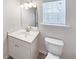 Small bathroom with vanity and toilet at 2286 Foley Park St, Snellville, GA 30078