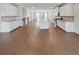 Open kitchen with white cabinets and granite countertops at 2286 Foley Park St, Snellville, GA 30078