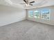 Bright bedroom featuring neutral walls and a ceiling fan at 2286 Foley Park St, Snellville, GA 30078