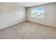 Cozy bedroom with neutral walls and a large window at 2286 Foley Park St, Snellville, GA 30078