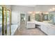 Spacious bathroom with corner vanity, garden tub, and separate shower at 761 Hardage Farm Nw Dr, Marietta, GA 30064