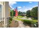 Inviting front yard with a flag and a glimpse of the neighborhood at 761 Hardage Farm Nw Dr, Marietta, GA 30064