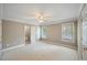 Bright bedroom with two windows and a ceiling fan at 761 Hardage Farm Nw Dr, Marietta, GA 30064