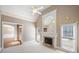 Spacious bedroom with a fireplace and large windows at 761 Hardage Farm Nw Dr, Marietta, GA 30064