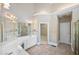 Large bathroom with double vanity, soaking tub, and walk-in shower at 761 Hardage Farm Nw Dr, Marietta, GA 30064