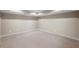 Finished basement room featuring neutral walls and carpet at 761 Hardage Farm Nw Dr, Marietta, GA 30064