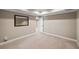 Finished basement bedroom with mirror and neutral color scheme at 761 Hardage Farm Nw Dr, Marietta, GA 30064