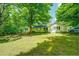 Charming ranch home with spacious yard, mature trees, and ample parking at 500 Cochran Rd, Covington, GA 30014
