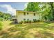 Side view of a ranch house with a large backyard at 500 Cochran Rd, Covington, GA 30014