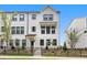 Two-story home with white brick and black accents at 2727 Harrison Dr, Lawrenceville, GA 30044