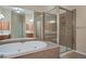 Spa-like bathroom with a walk-in shower and a large soaking tub at 4740 Legacy Cove Ln, Mableton, GA 30126