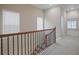 Upstairs hallway with carpet and neutral wall colors at 4740 Legacy Cove Ln, Mableton, GA 30126