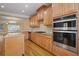 Modern kitchen with double oven and granite countertops at 4740 Legacy Cove Ln, Mableton, GA 30126