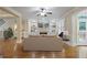 Spacious living room with hardwood floors, fireplace and built-in shelving at 4740 Legacy Cove Ln, Mableton, GA 30126