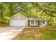 Image 1 of 24: 235 E Country Woods Dr, Covington