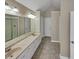 Bathroom with double vanity and walk-in shower at 421 Thornbush Trce, Lawrenceville, GA 30046