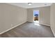 Simple bedroom with neutral walls and carpeting at 421 Thornbush Trce, Lawrenceville, GA 30046