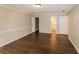 Spacious bedroom with hardwood floors and access to bathroom at 2848 Creekwood Dr, Snellville, GA 30078