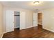 Bright bedroom featuring hardwood floors and ample closet space at 2848 Creekwood Dr, Snellville, GA 30078